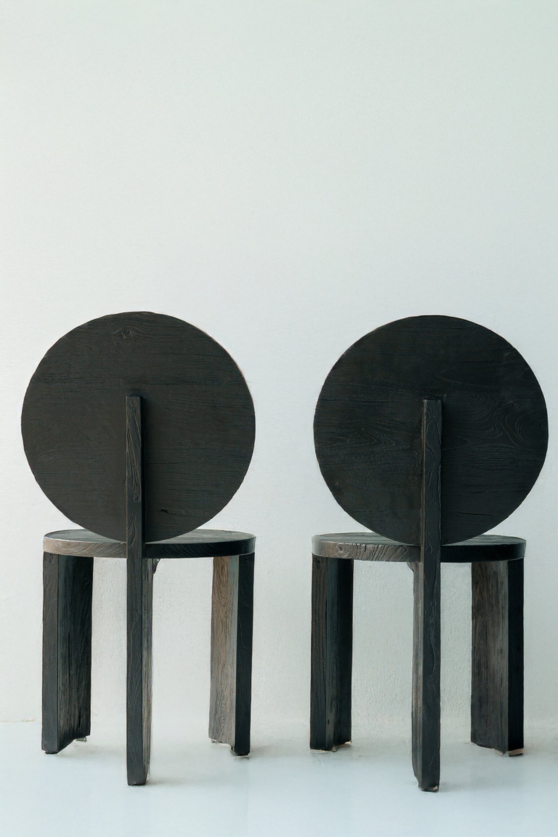 A pair of Chair 00 seen from behind