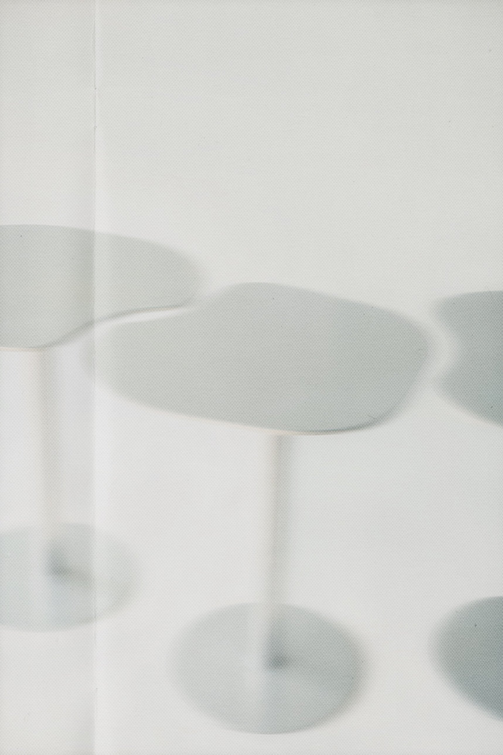 Soft, blurred view of the tops and round bases